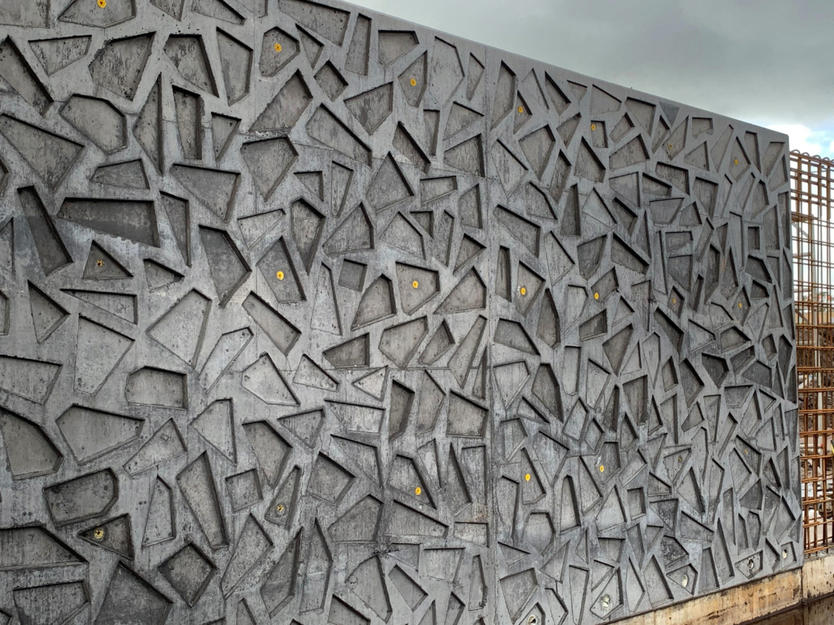 Patterned concrete walls at Suncentral Corso